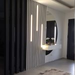 Декоративни црни летви со кружно огледало и LED светло